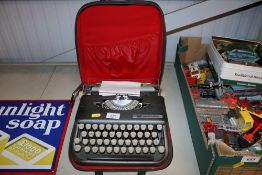 A Smith Corona typewriter and case