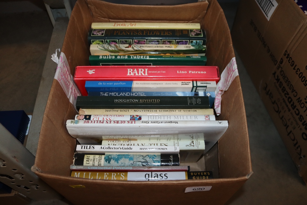 A box containing various antique reference and gardening books