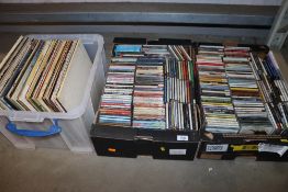 Three boxes containing various records and CDs