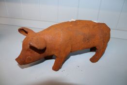 A cast iron ornament in the form of a pig (57)