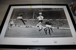 A framed and glazed print depicting 'The Cup King' series World Cup semi final 1966, having Nobby