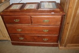 A hardwood chest fitted two short over two long dr