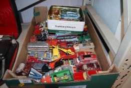 A box containing various die cast vehicles to include Corgi, Dinky Toys etc.