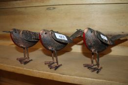 Three tin plate ornaments in the form of robins (63)
