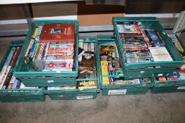 Six boxes containing various DVDs and books