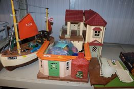 A quantity of various Playmobile toys and various