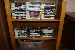 A quantity of various X-box and X-box 360 video games and a box of various CDs. Sold as seen