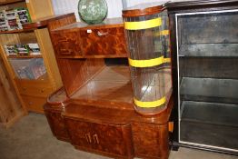 An Art Deco style display cabinet, raised on cupboard base, glass AF