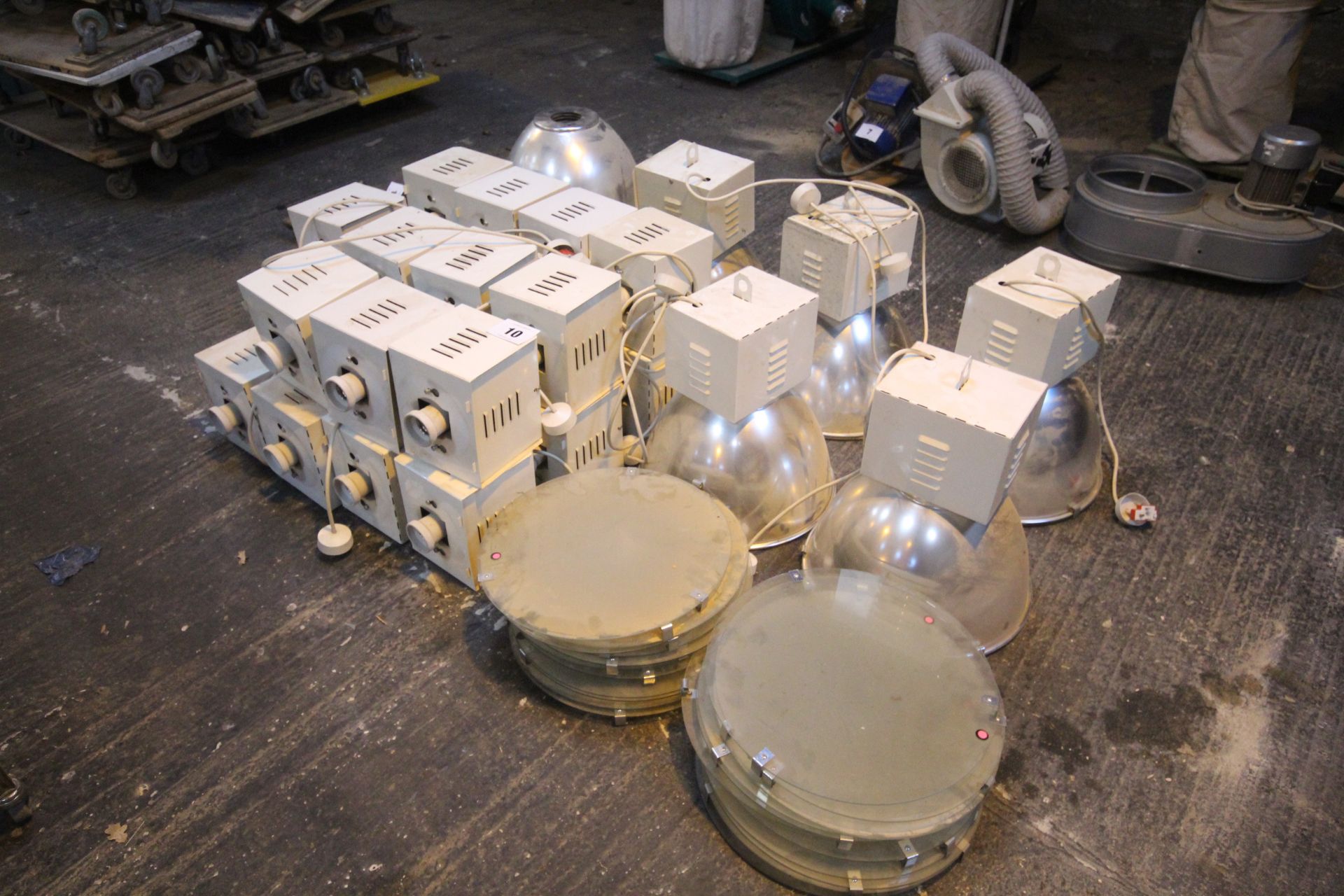 Quantity of sodium industrial high bay light fittings. With some shades and glass.