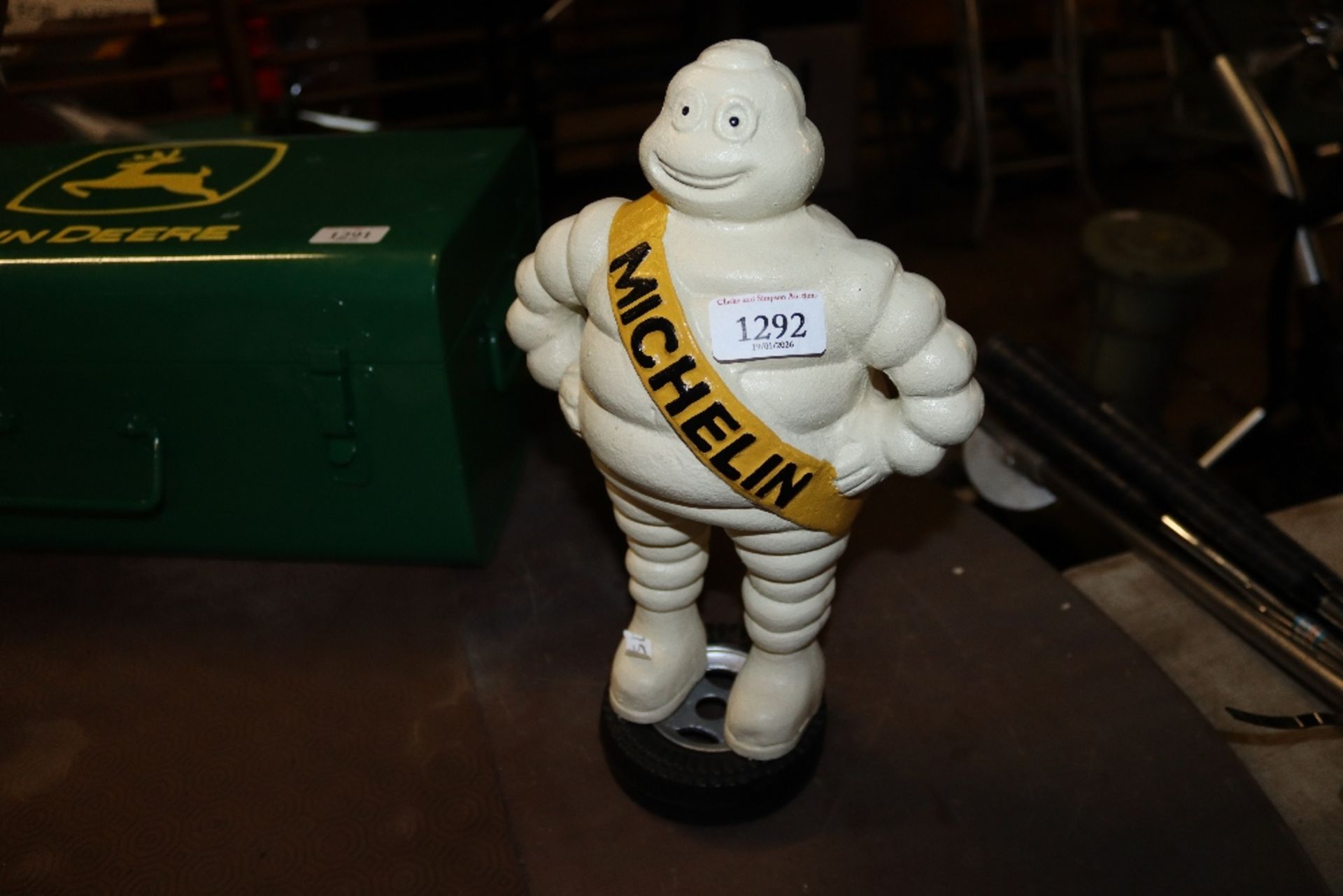 A painted cast iron statue in the form of the Mich