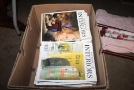 A box containing The World of Interiors magazines