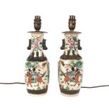 A pair of Chinese crackle glaze and enamel coloured baluster lamp bases, decorated warriors, 26cm