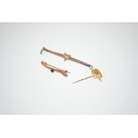 A 9ct gold brooch set with amethyst in the form of