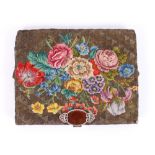 A leather wallet, by Asprey & Co. having 9ct gold mounts; a crocodile skin purse with silver mounts;
