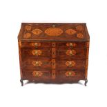 An 18th Century Continental walnut and marquetry bureau of serpentine shape, possibly Maltese