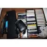A box containing a Sony Walkman and various cassette tapes