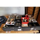 Two trays of various brass fittings; to include door handles, picture hooks, key holes etc.