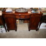 A Victorian mahogany twin pedestal sideboard fitted three drawers to frieze with cellarette drawer