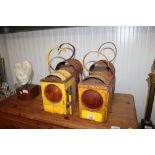 Four railway lanterns