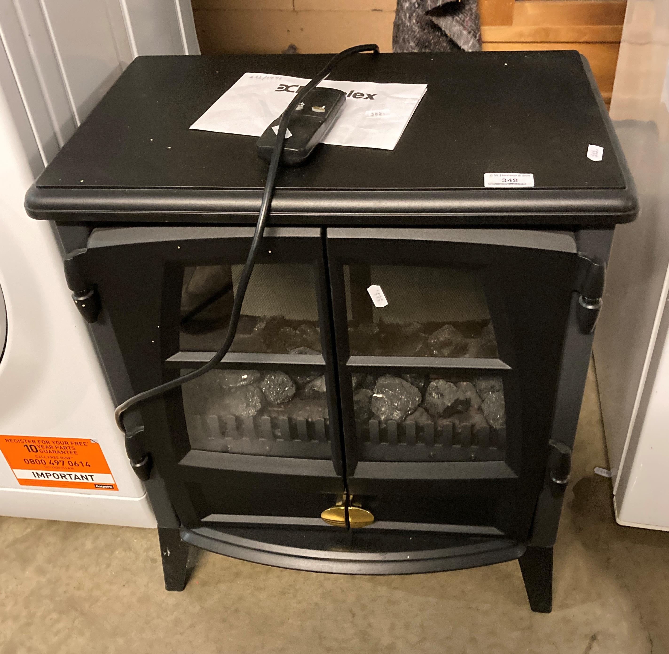 A Dimplex Jazz 20R coal effect electric stove complete with remote ...