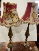 A pair of brass eastern inspired tall table lamps with shades, each approximately 70cm high,