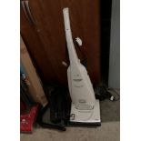 Three assorted vacuum cleaners by Panasonic,