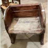 A small stained pine church pew (evidence of old woodworm),