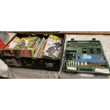 A Nitehawk NH84 gun cleaning kit in green case and a crate of Airgun World and Air Gunner magazines