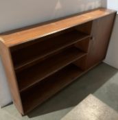 A G-Plan mid-century teak three shelf open bookcase with single cupboard to right,