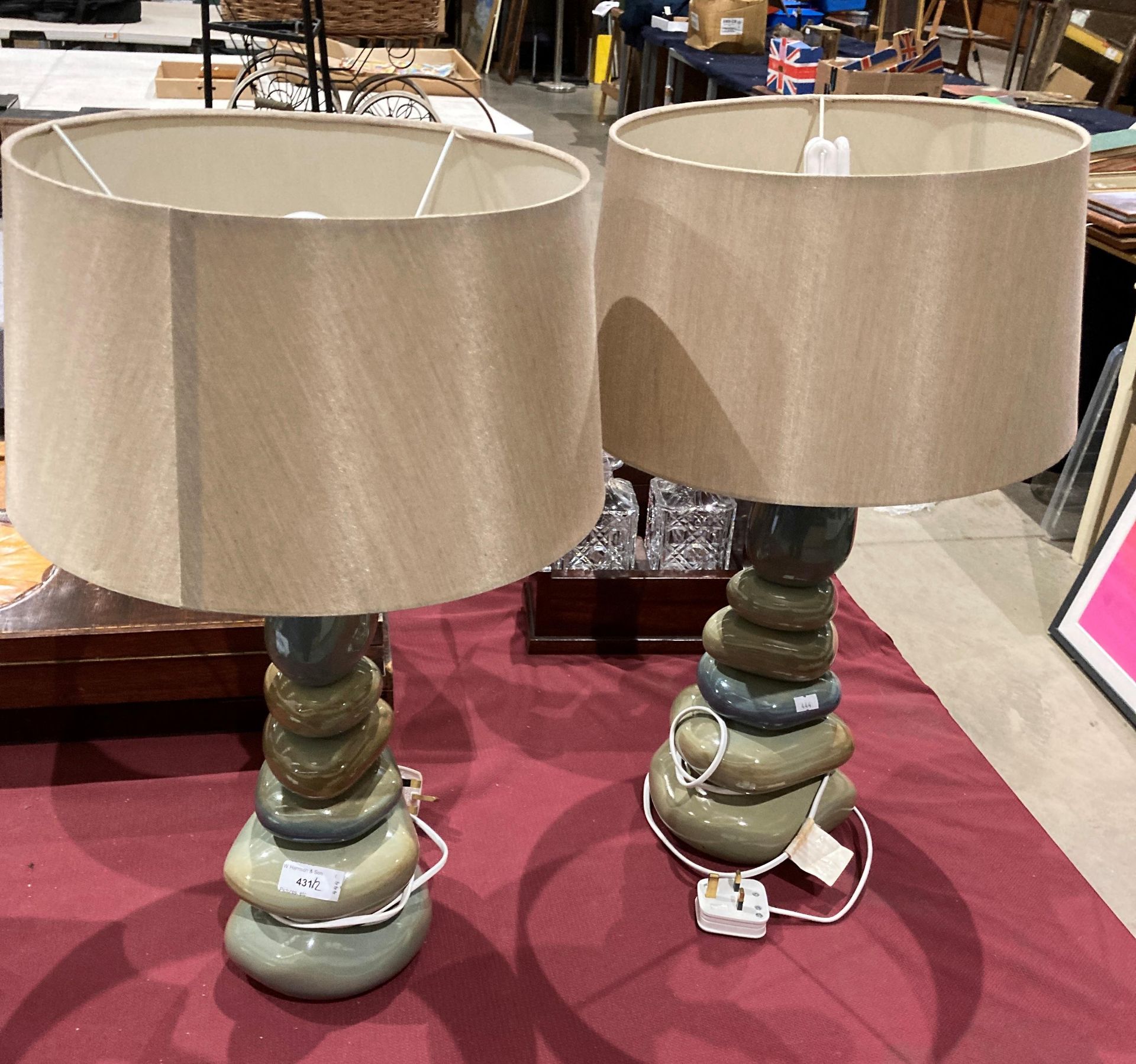 Feature Lamp A pair of ceramic pebble feature table lamps with shades, each 58cm ...