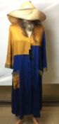 Three items; a Christian Dior blue and gold house coat (size 2) with original label,