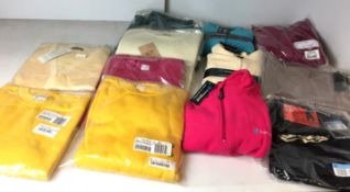 Twelve ladies garments including nine tops and three pairs of bottoms assorted sizes most in