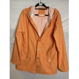 Rains waterproof jacket in orange,
