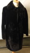 Dark brown faux fur coat - please note: mannequin not included (CWH Ref: Rail D) Further