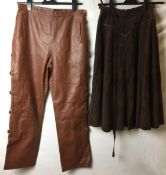 Two ladies garments; Louis Feraud brown suede skirt,