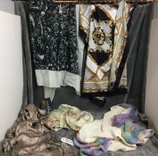 Five shawls/scarves including by Alexander McQueen with original label attached, Henry Moore,