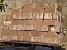 Approximately 400 red house bricks (two styles).