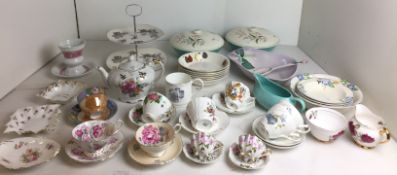 Thirty-eight pieces of china including Coalport WA Christmas 1997 mug, musical box teapot,