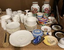 Contents to end of rack - cups, saucers, plates, vases,