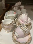 Twenty-three pieces of Royal Albert Lavender Rose cups and saucers and tea and dinner plates,