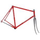 A Colnago bicycle frame and fork set, with Campagnolo Athena headset, shaped lugs, red with chrome
