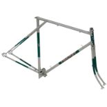A Les Cassell Silverlight Thanet bicycle frame and fork set, silver and green with applied decals.