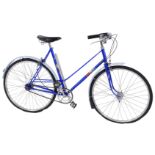 A Velos Cycle Paris bicycle, with a Reynolds 531 blue frame with Paris stickers, and Sturmey