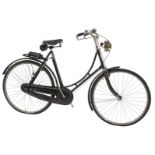 A BSA lady's bicycle, the black frame with gold and red painted line decoration, mounted with a