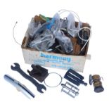 Various bicycle spares and tools, including pedals, cables, small mudguards, Campagnolo cables and
