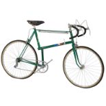 A Velos Paris touring bike, the Reynolds 531 green frame with Velos Paris advertising and crest,