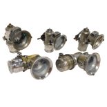 Five Joseph Lucas Ltd Birmingham carbide bicycle lamps, three Calcia Club examples, one in a brass