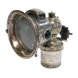 A Miller Bola carbide/acetylene bicycle lamp, each side inset with a faceted red and green glass