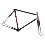 A Sun Wasp lightweight bicycle frame, with ornate polished lugs and brass head badge, black with