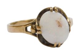 A lady's dress ring, claw set with opal coloured stone, marked .375, 2.2g all in, size N.